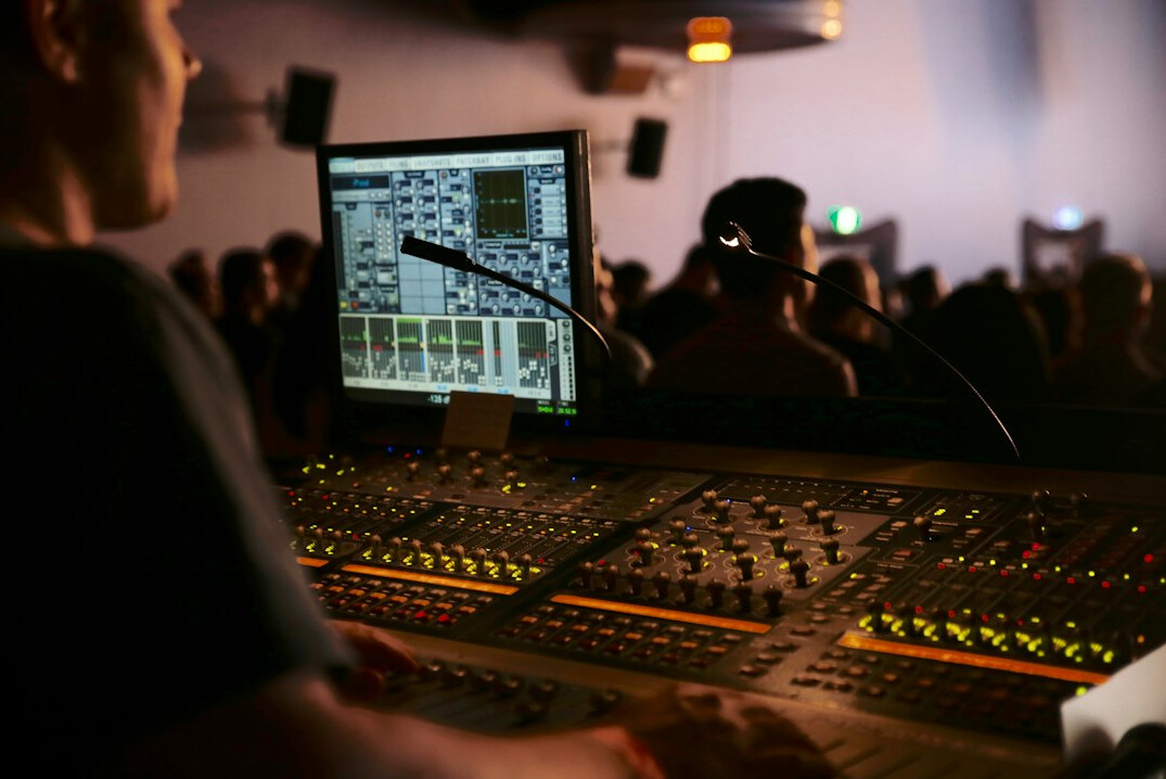 Television control room with multiple broadcast monitors